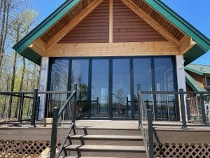 Modern home with black aluminum fall protection railings on deck in Minnesota