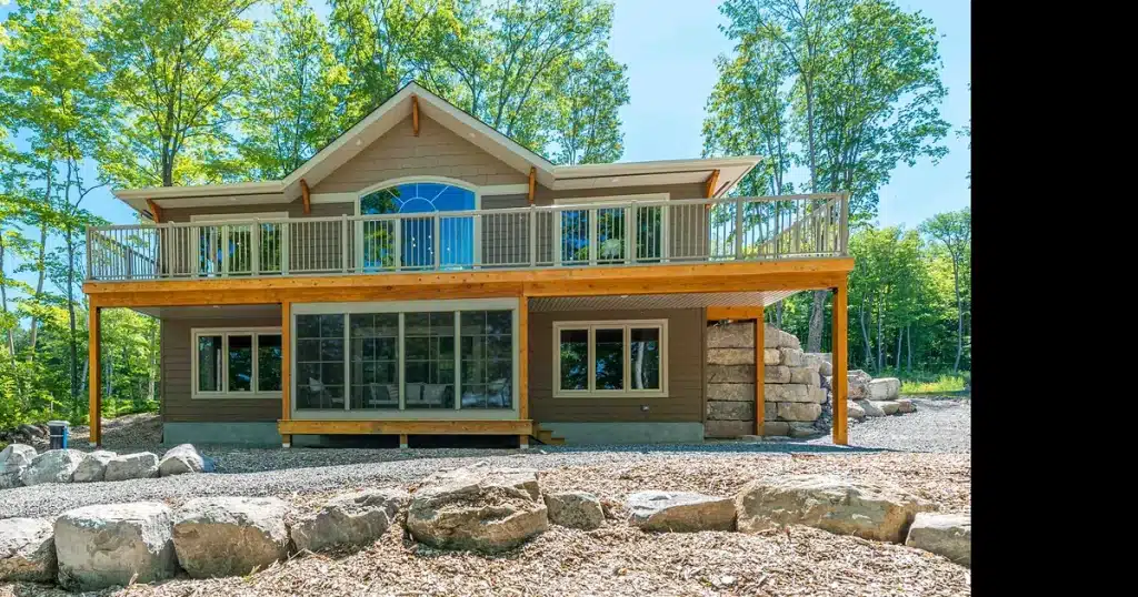 Raised Minnesota home with an enclosed room built beneath the upper deck
